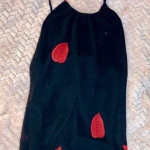 Fashion Nova long black dress with red leaves on it